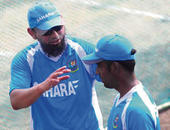 Saqlain to help Ajmal correct illegal action...