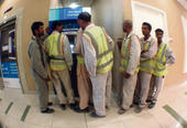 India seeks higher pay for millions of Gulf workers