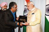 Modi unveils Maneesh Media’s 'Jewels of Gujarat - Leading Global Gujarati Personalities'