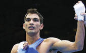 Olympian boxer suspended for graft...