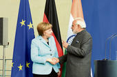 Modi, Merkel vow to push economic ties to new level...