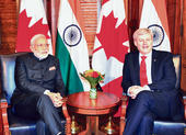 Modi, Harper cement ties with uranium deal...