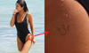 Selena Gomez Om tattoo