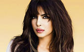 It's strange to walk on stage in bikini: Priyanka...