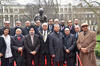 Dignitaries pose for camera in front of Gandhi statue at the Martyrs' Day event at Tavistock Square, London 