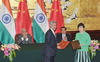 Modi with Li Keqiang signing of agreement