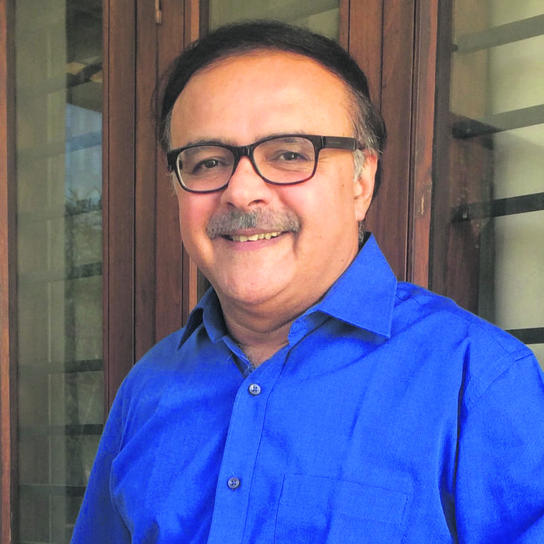 Dr. Hansal Bhachech
