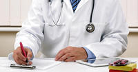 GP writing a prescription copy GP writing a prescription copy