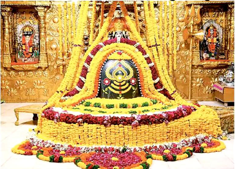 On the first day of Shravan, Somnath Mahadev is adorned with yellow flowers.