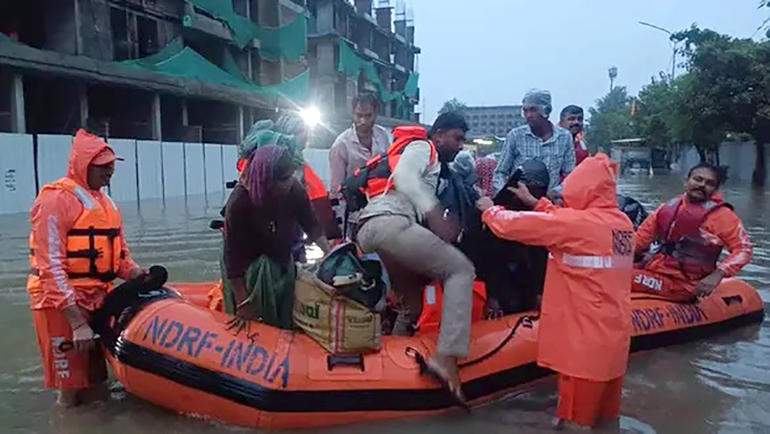 rain surat sdrf team