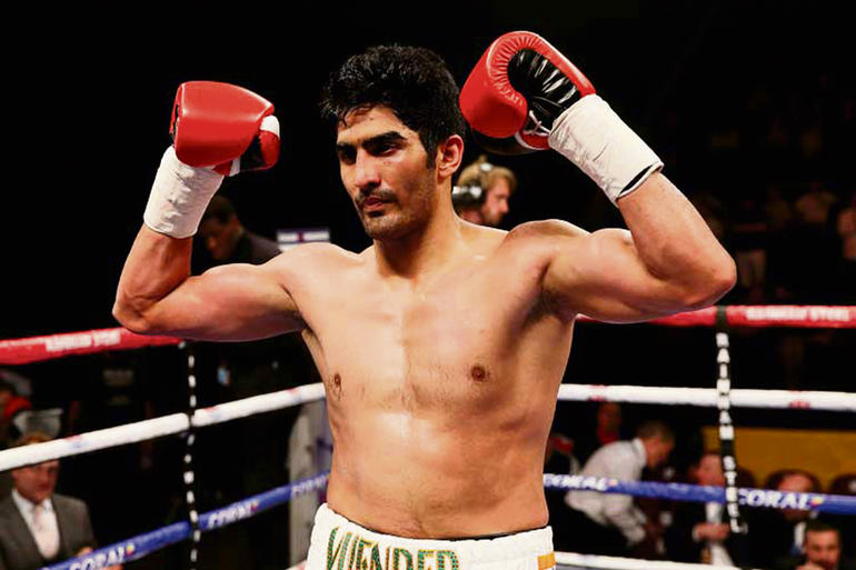 Vijender knocks out Francis Cheka to defend WBO title copy