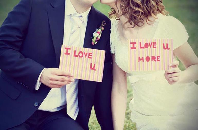 wedding-couple-with-love-signs